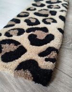 zoom tapis de clavier léopard tufting
