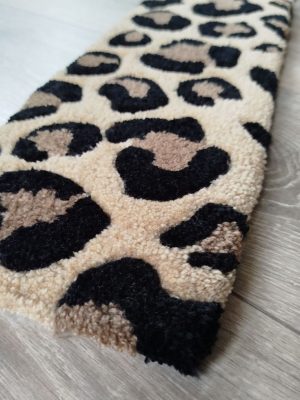 zoom tapis de clavier léopard tufting